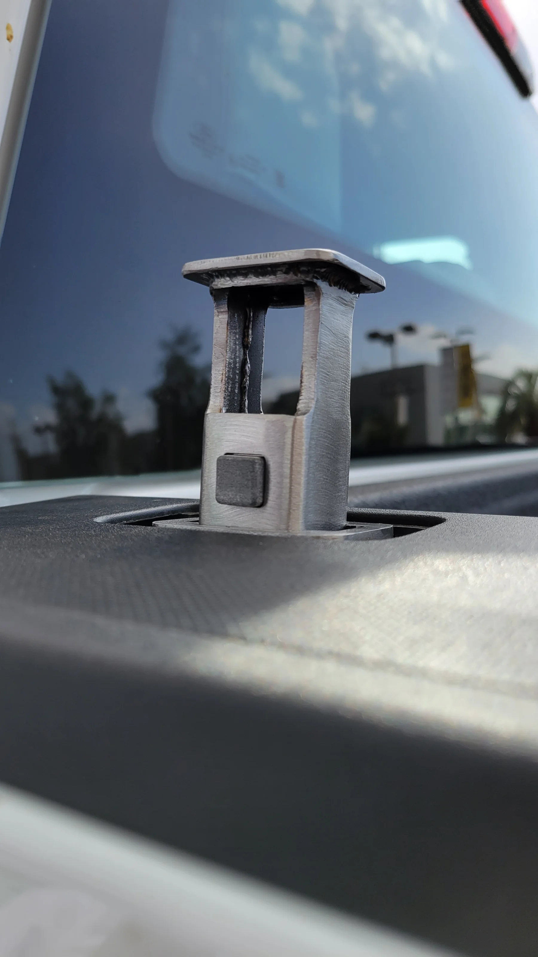 Side view of Pocket Anchor prototype installed in a truck bed stake pocket